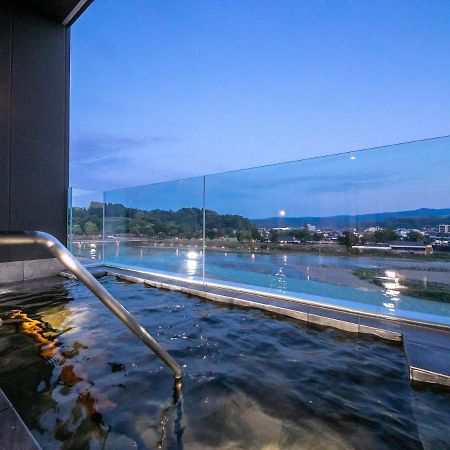 Hitoyoshi Onsen Nabeya Hotel Bagian luar foto