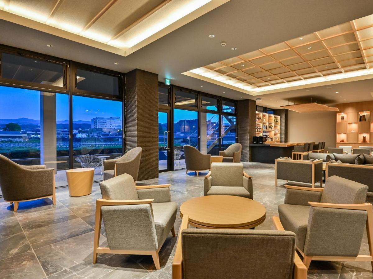 Hitoyoshi Onsen Nabeya Hotel Bagian luar foto
