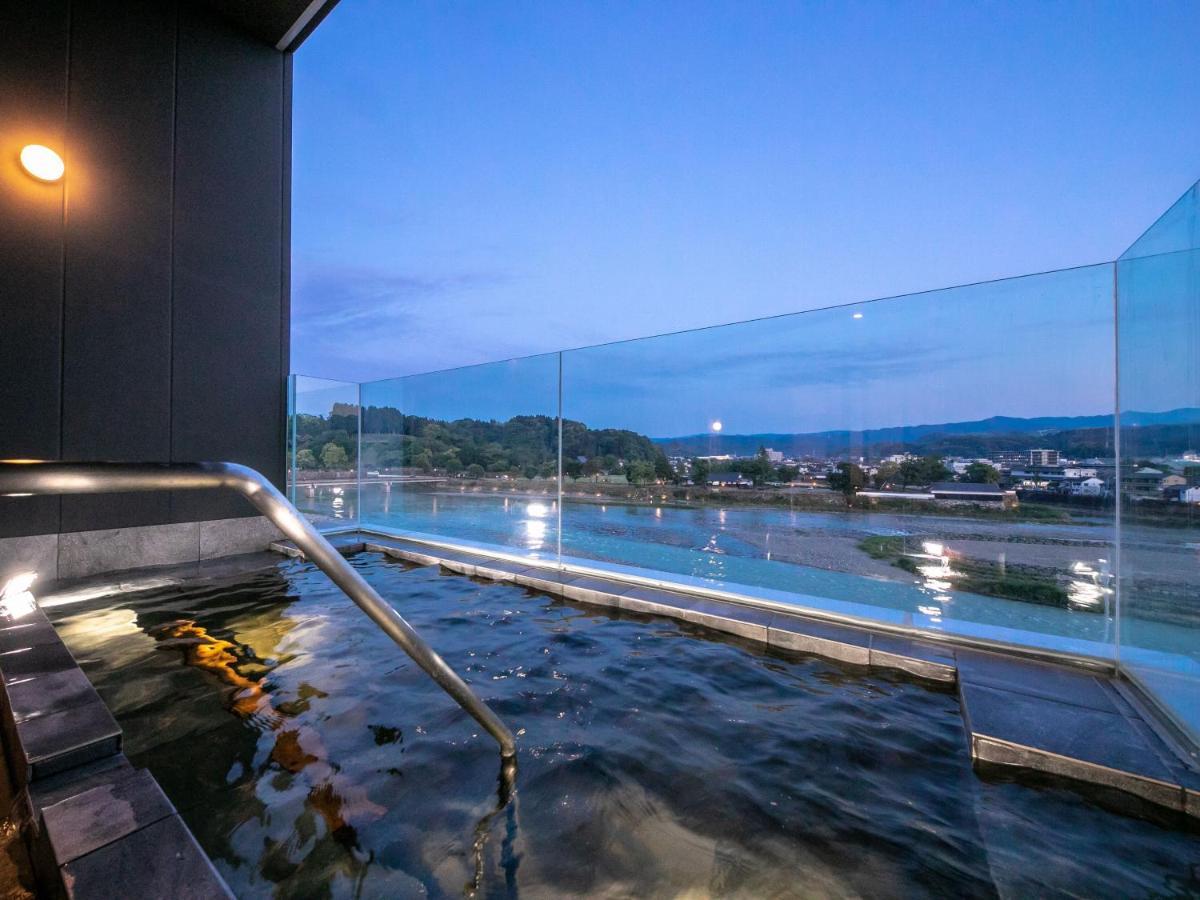 Hitoyoshi Onsen Nabeya Hotel Bagian luar foto
