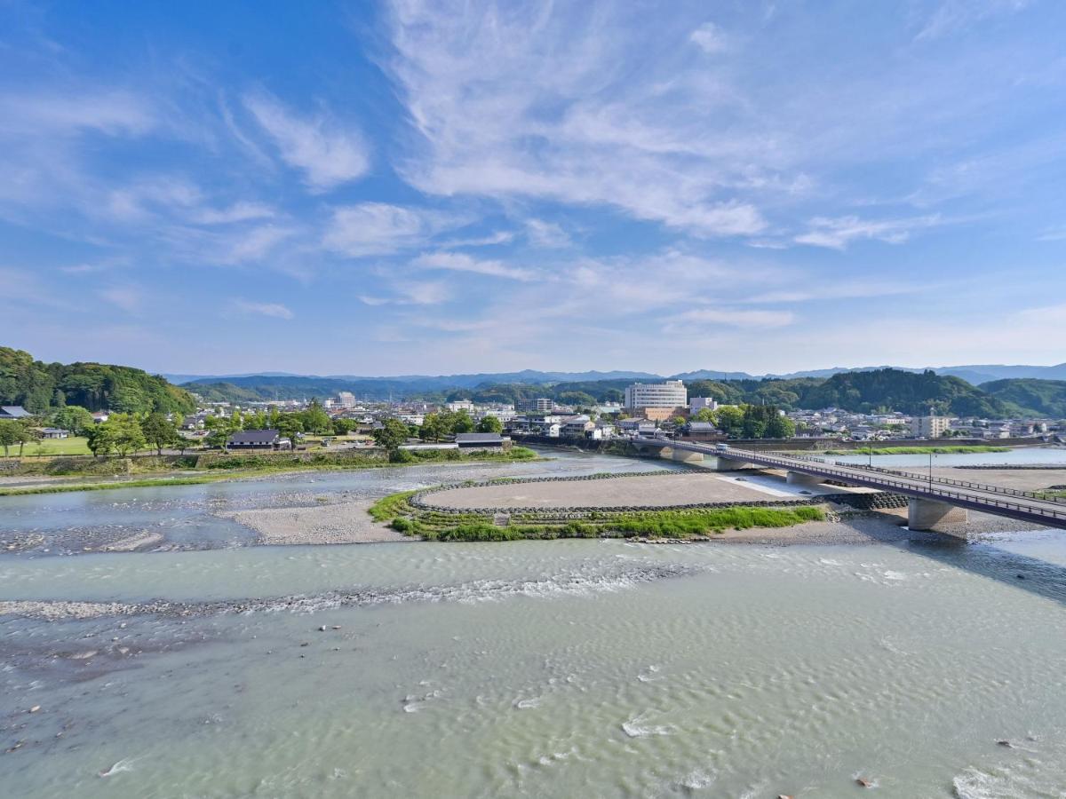 Hitoyoshi Onsen Nabeya Hotel Bagian luar foto