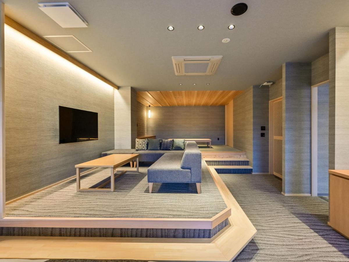 Hitoyoshi Onsen Nabeya Hotel Bagian luar foto