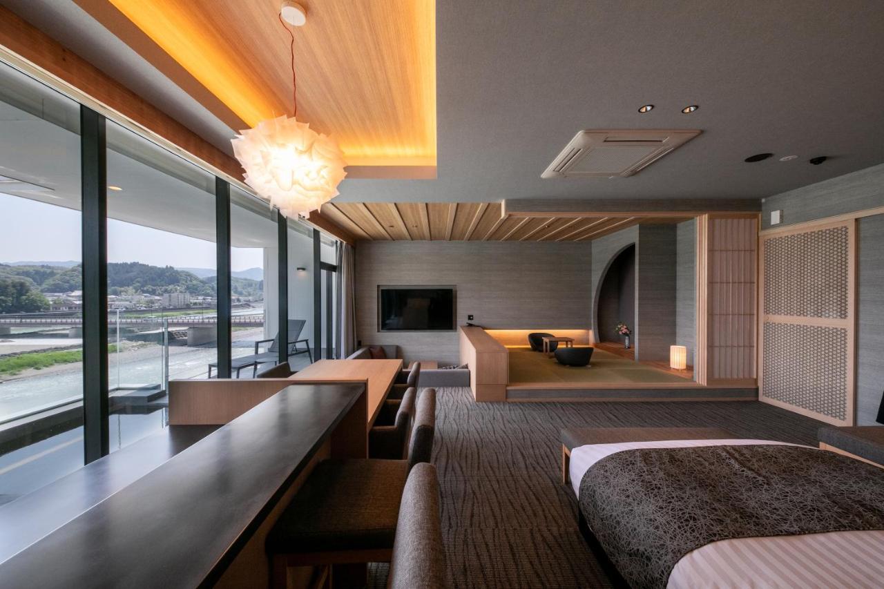 Hitoyoshi Onsen Nabeya Hotel Bagian luar foto
