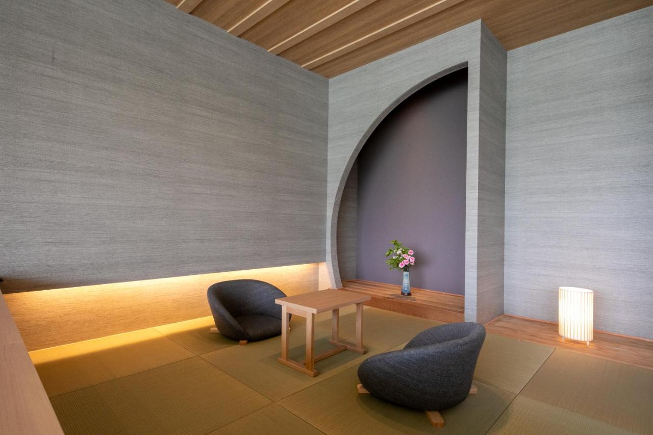 Hitoyoshi Onsen Nabeya Hotel Bagian luar foto