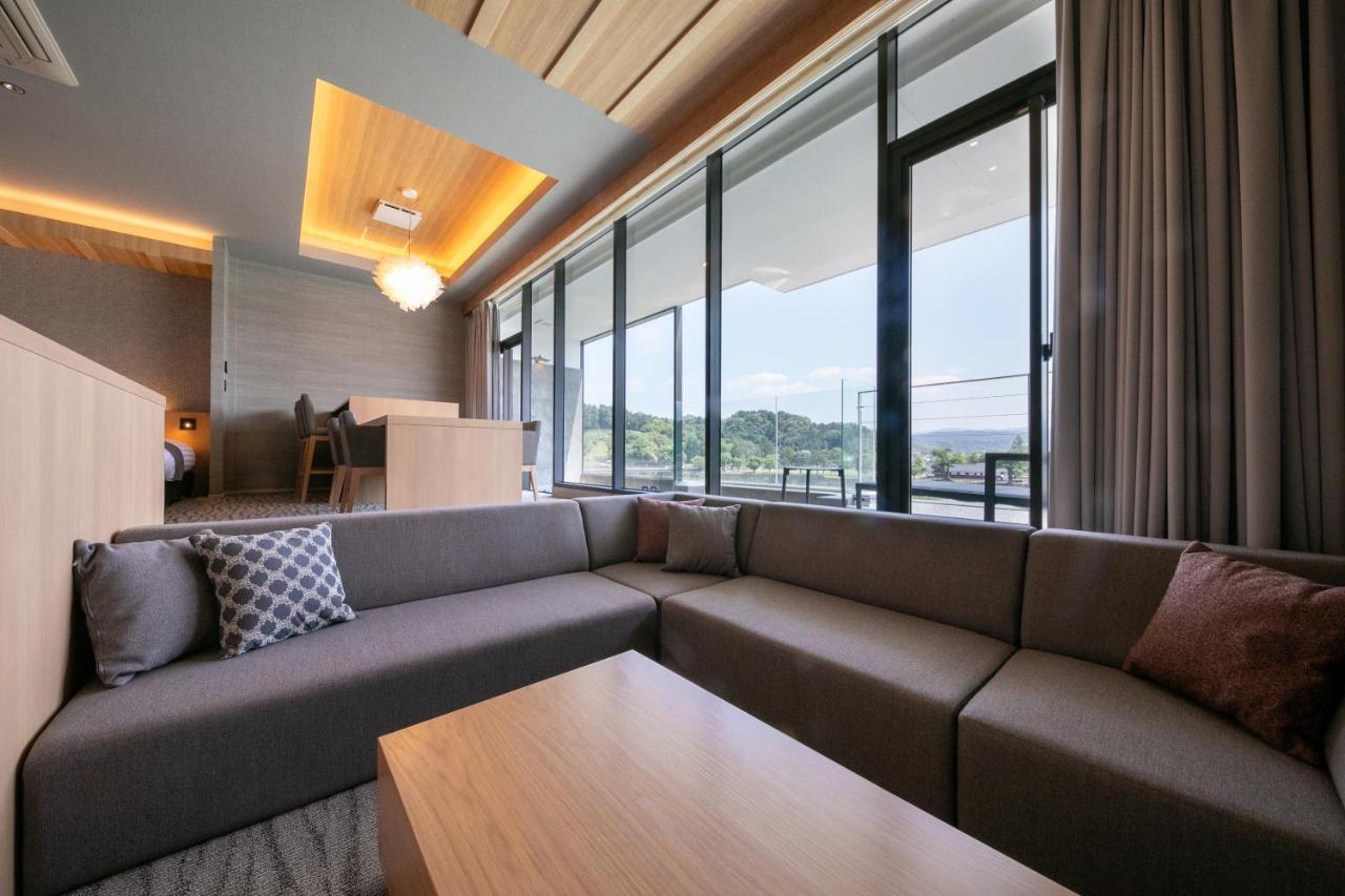 Hitoyoshi Onsen Nabeya Hotel Bagian luar foto