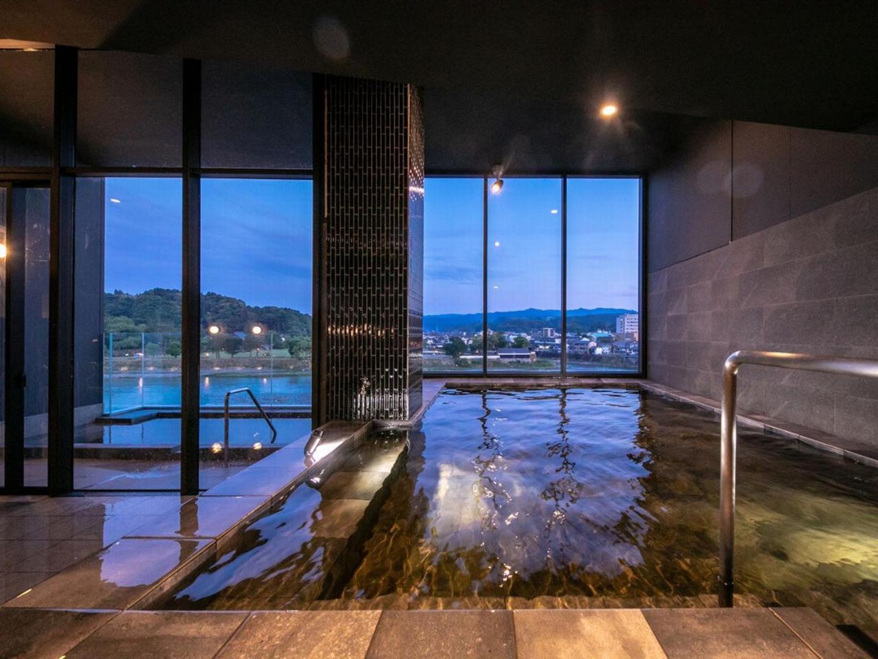 Hitoyoshi Onsen Nabeya Hotel Bagian luar foto