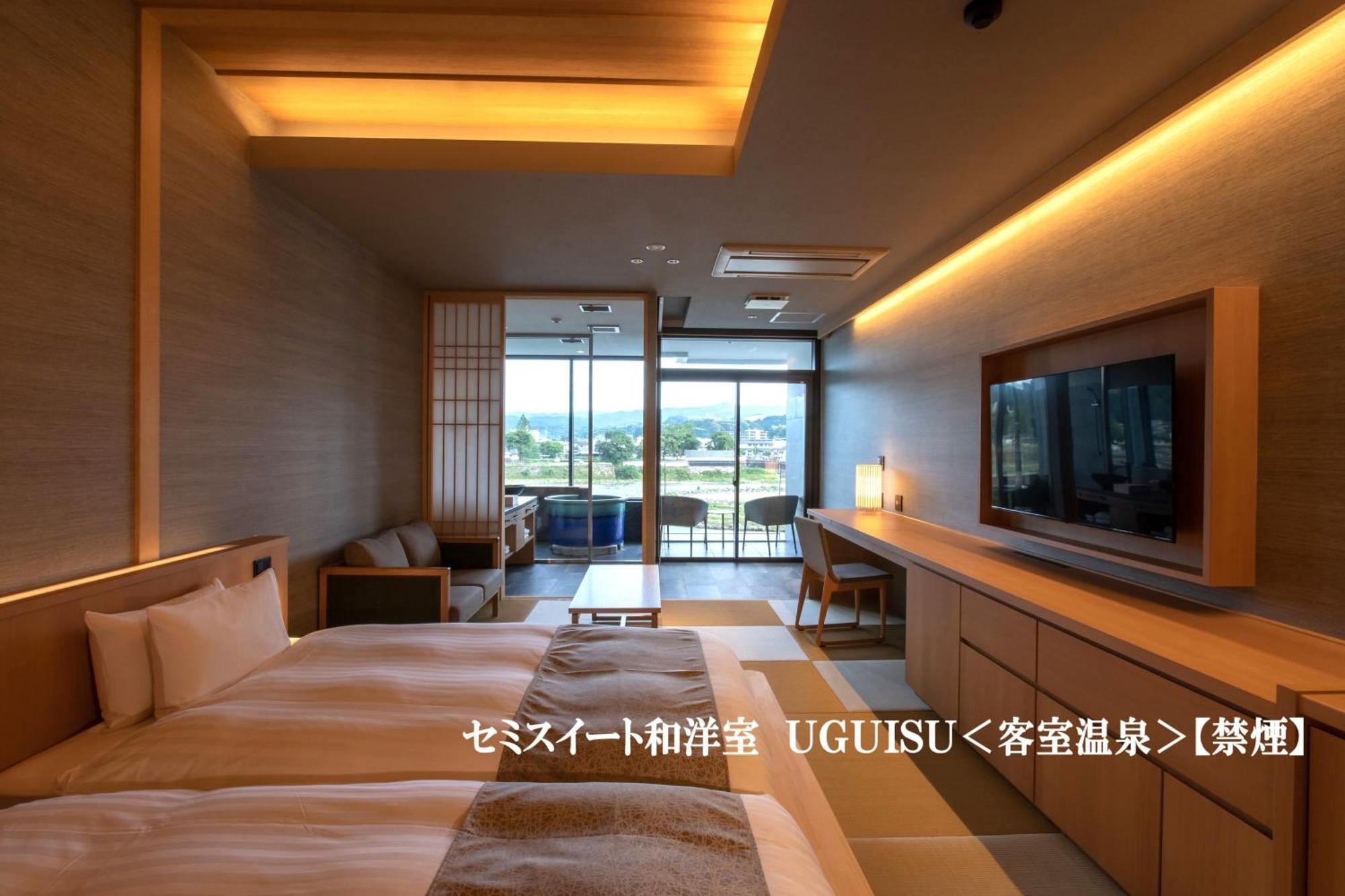 Hitoyoshi Onsen Nabeya Hotel Bagian luar foto