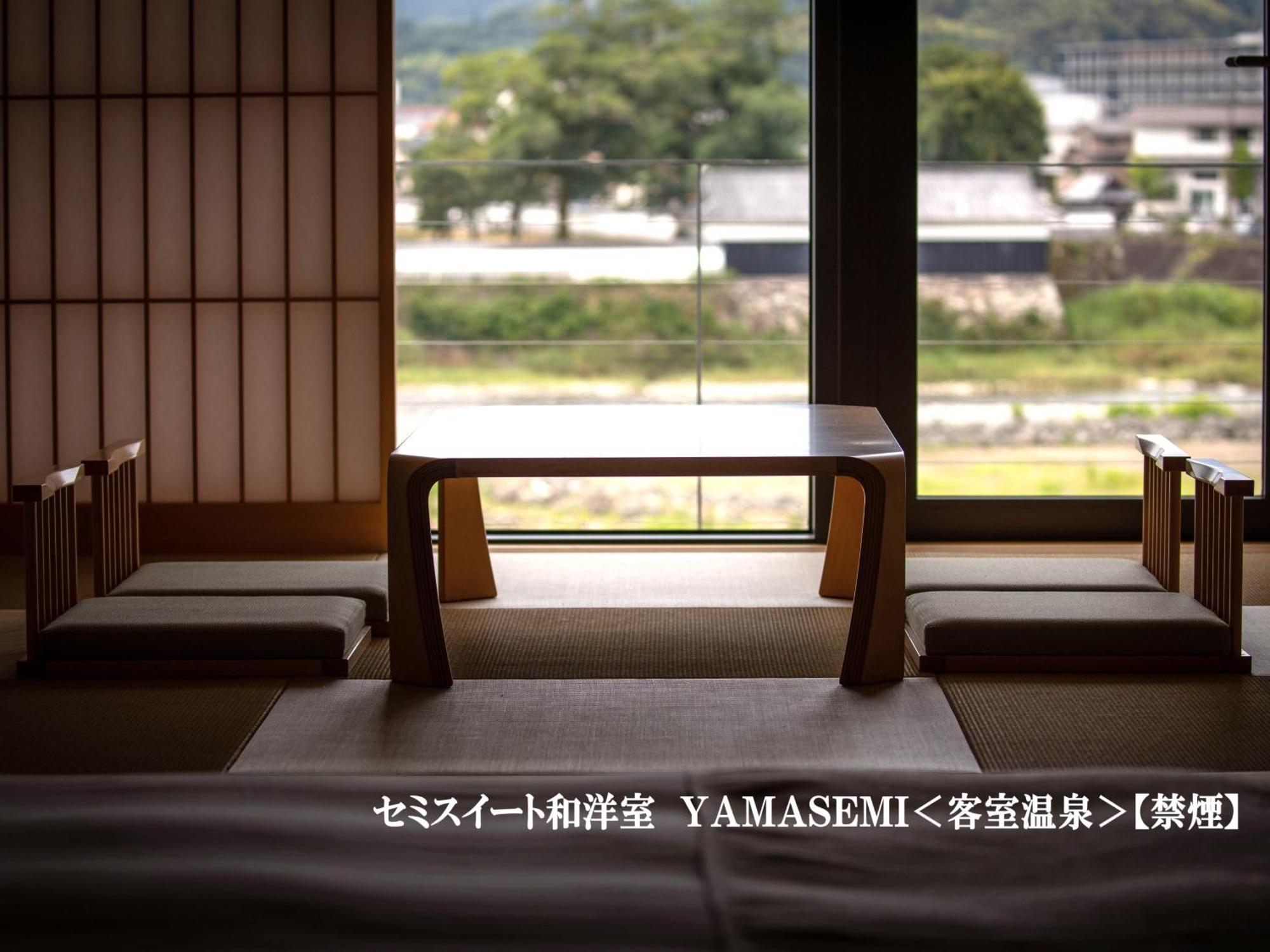 Hitoyoshi Onsen Nabeya Hotel Bagian luar foto